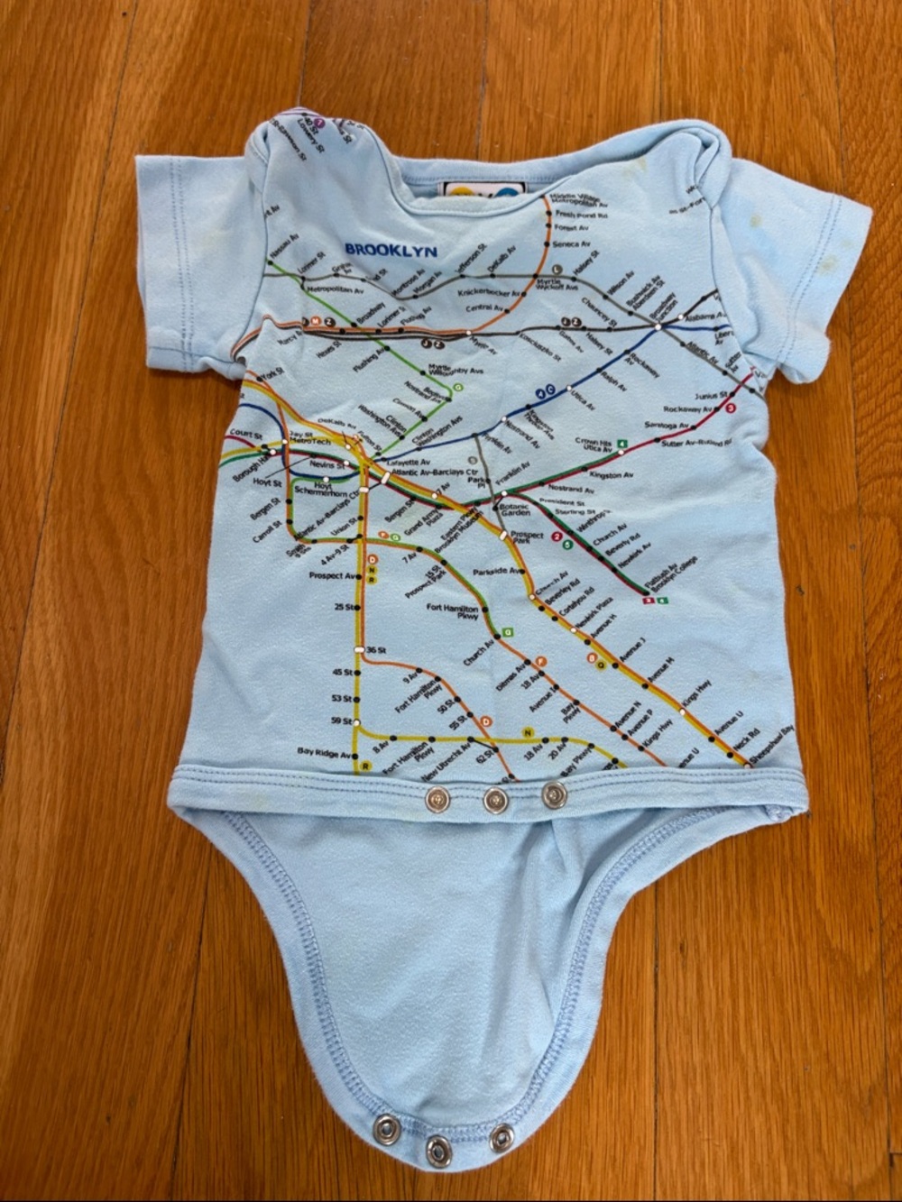 NYC Light Blue Baby Bodysuit with Black Logo